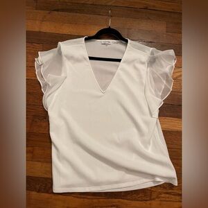 Calvin Klein Sleeveless top. Creamy white . Ruffle sleeve Blouse size XL nwot